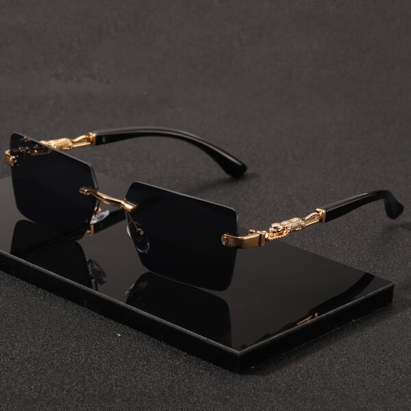 A pair of fashionable glasses with a retro style, featuring rimless leopard print temples and a compact trendy frame
